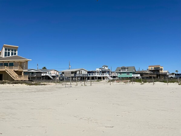 On the beach, sun-loungers