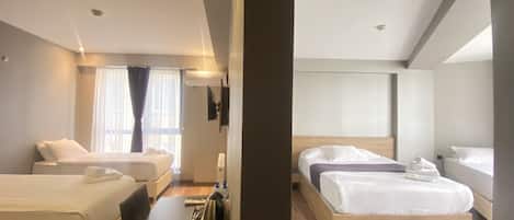 Ropa de cama de alta calidad, minibar y escritorio