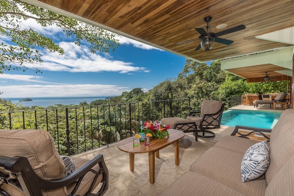 One of two main-floor decks surrounding pool