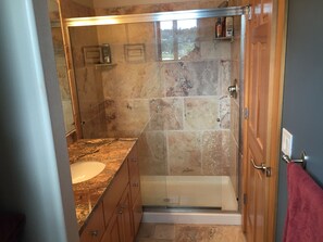 Combined shower/tub, towels, soap, toilet paper
