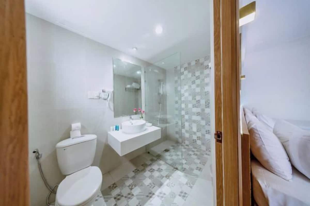 Bathroom | Shower, designer toiletries, hair dryer, bathrobes