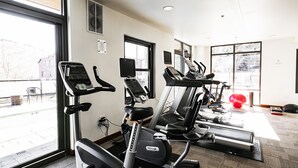 A gym with treadmills, stationary bikes, and a red exercise ball. - Managed by Park City Lodging-Hotel Room Ski-In/Out-Park City Mtn-Hot Tub/Pool (Park City)