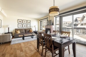 Window walls and large picture windows flank the north side of the condo for spectacular plaza and mountain views from the dining room and livin groom