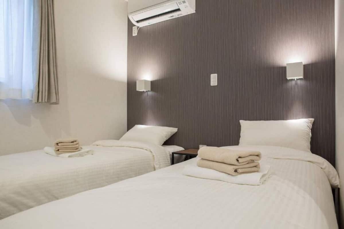 Room (102,202,302) | Laptop workspace, iron/ironing board, free WiFi, bed sheets