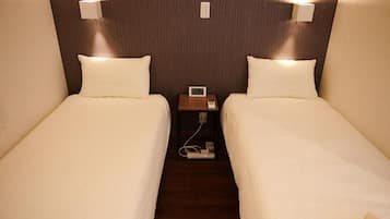 Laptop workspace, iron/ironing board, free WiFi, bed sheets