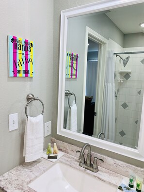 Shower, hair dryer, towels, soap