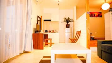 Premium Villa, Ocean View | Living area | Flat-screen TV