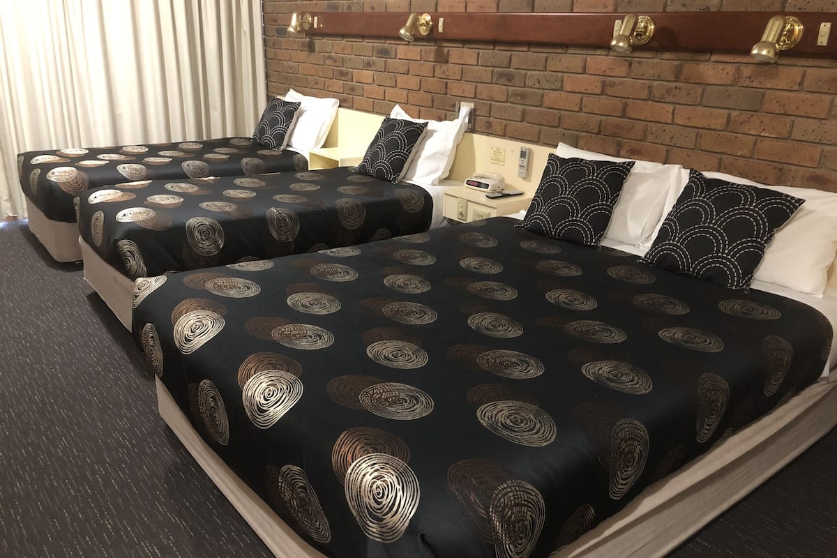 Deluxe Family Room | Premium bedding, minibar, desk, laptop workspace