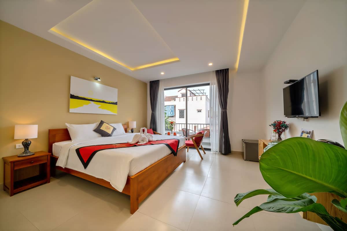 Habitación doble Deluxe, balcón | Ropa de cama hipoalergénica y minibar