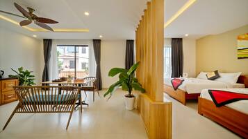 Grand Suite Family Room With Balcony | Private kitchen | Coffee/tea maker, electric kettle, highchair, paper towels