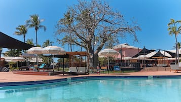 2 outdoor pools, open 7:00 AM to 7:00 PM, pool loungers
