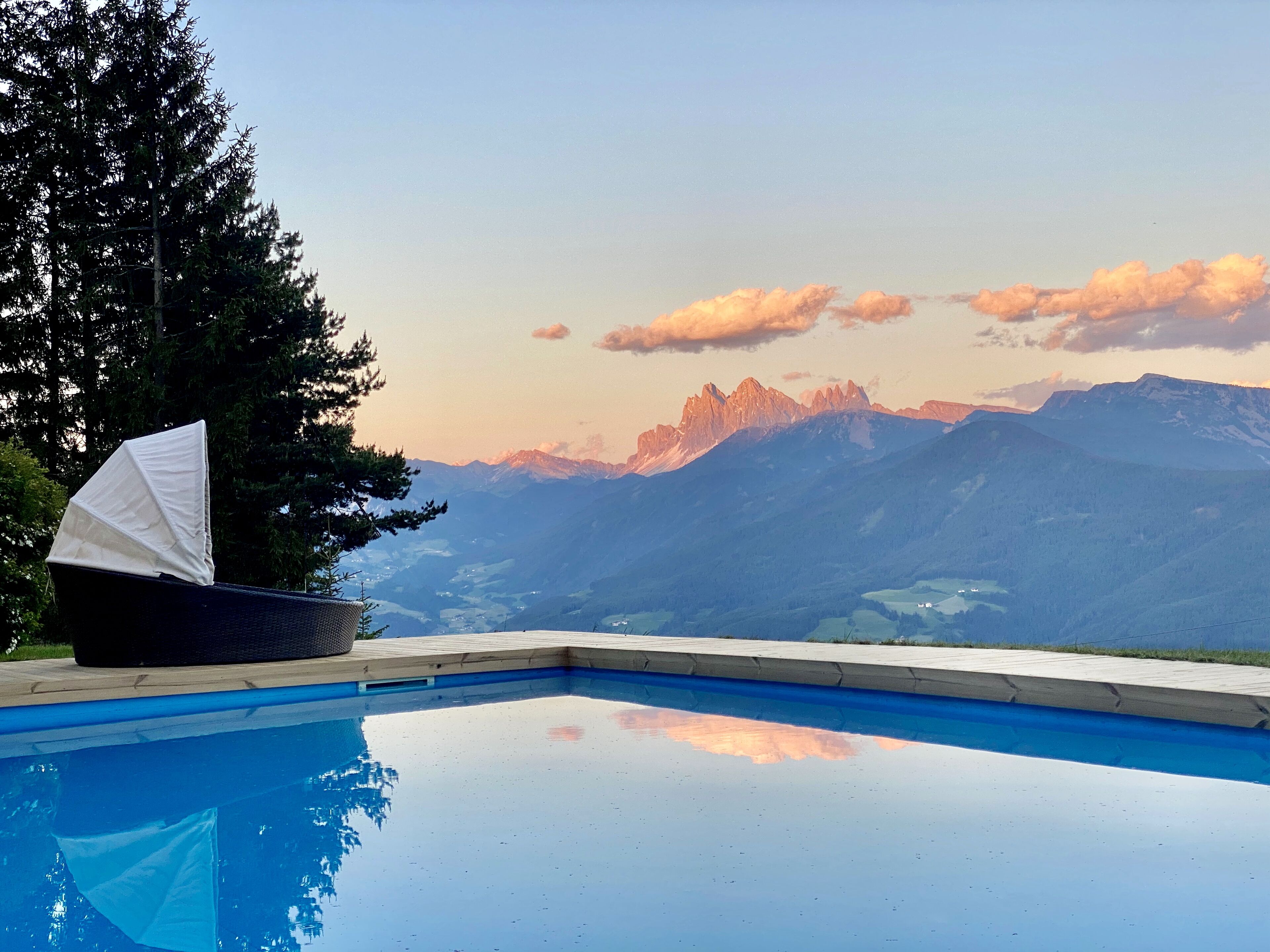 A swimming pool with a view of mountains.