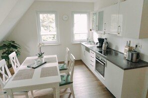 Fridge, oven, dishwasher, high chair