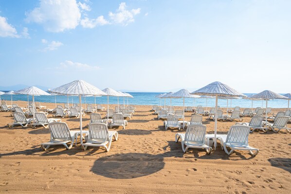 Private beach, sun loungers, beach umbrellas, beach towels