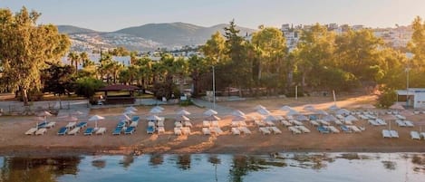 Private beach, sun loungers, beach umbrellas, beach towels