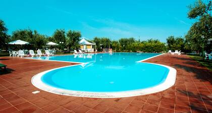 Bilocale in Villa con Piscina