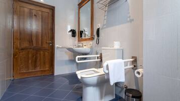Quadruple Room | Bathroom | Rainfall showerhead, designer toiletries, hair dryer, bathrobes