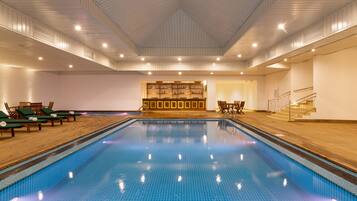 Indoor pool, outdoor pool, open 7:00 AM to 9:00 PM, pool loungers