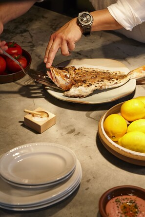 Savor the art of culinary preparation in a casual dining setting.