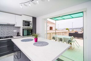 Villa (Three-Bedroom Villa) | Private kitchen | Fridge