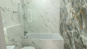 Combined shower/bathtub