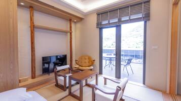 Japanese-style Triple Room, Non Smoking, Mountain View | Living area | Flat-screen TV