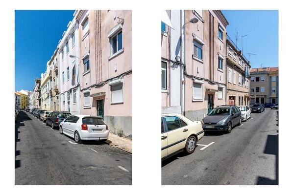 A row of parked cars along a street with buildings on either side. - Urban Oasis Haven with AC & Patio (Lisboa)