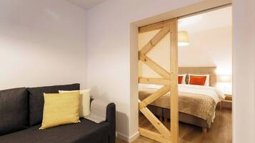 1 slaapkamer, een strijkplank/strijkijzer, wifi, beddengoed