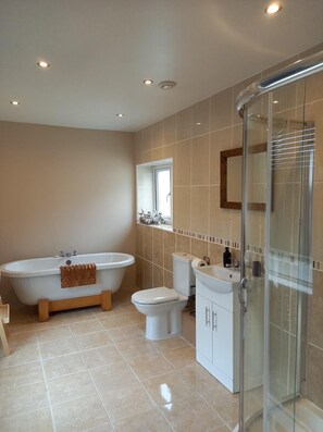 Bathtub, hair dryer, towels, soap
