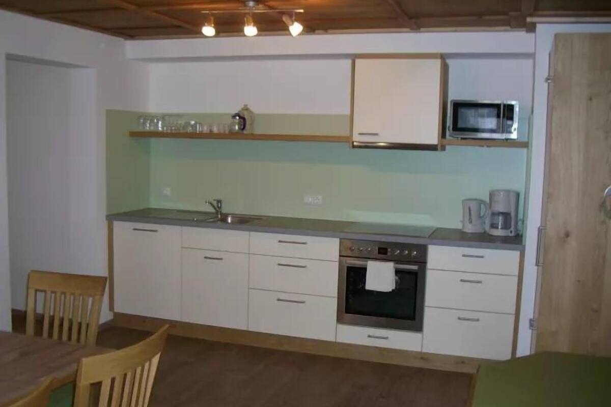 Departamento | Cocina privada | Refrigerador, horno, parrilla de estufa y utensilios de cocina 