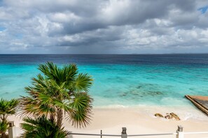 On the beach, sun loungers, beach towels