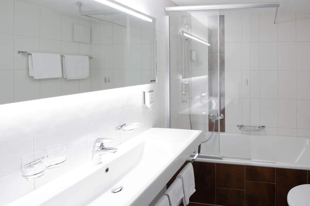 comfort double room | bathroom | shower, hair dryer, towels