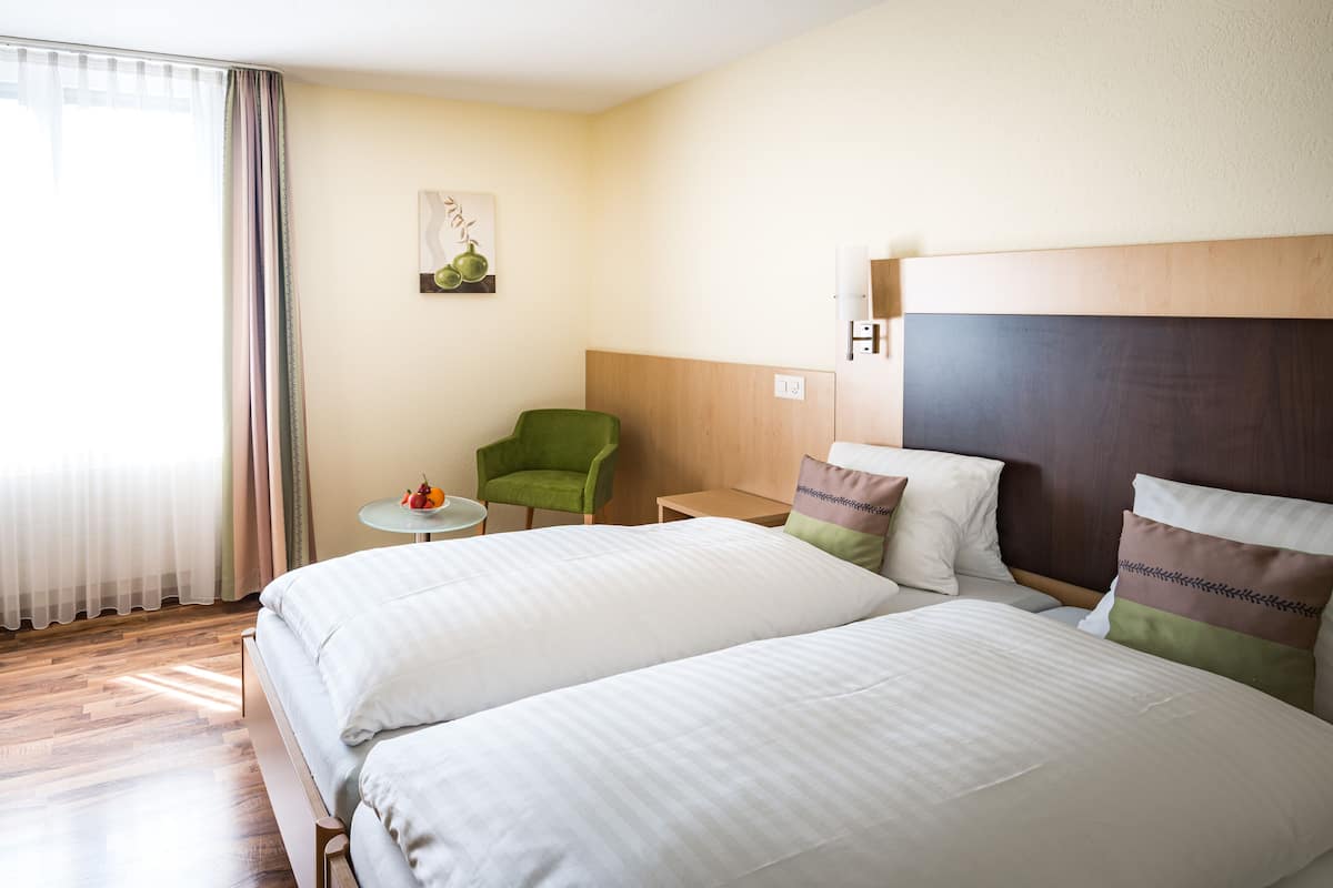 basic double room | in-room safe, desk, laptop workspace, blackout curtains