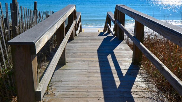 A wooden boardwalk leading to the beach with a clear view of the ocean. - Coastal Condo with Amazing View & Beach Access (Santa Rosa Beach)