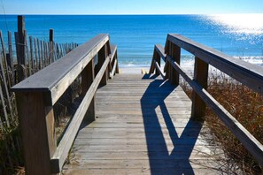 A wooden boardwalk leading to the beach with a clear view of the ocean. - Coastal Condo with Amazing View & Beach Access (Santa Rosa Beach)