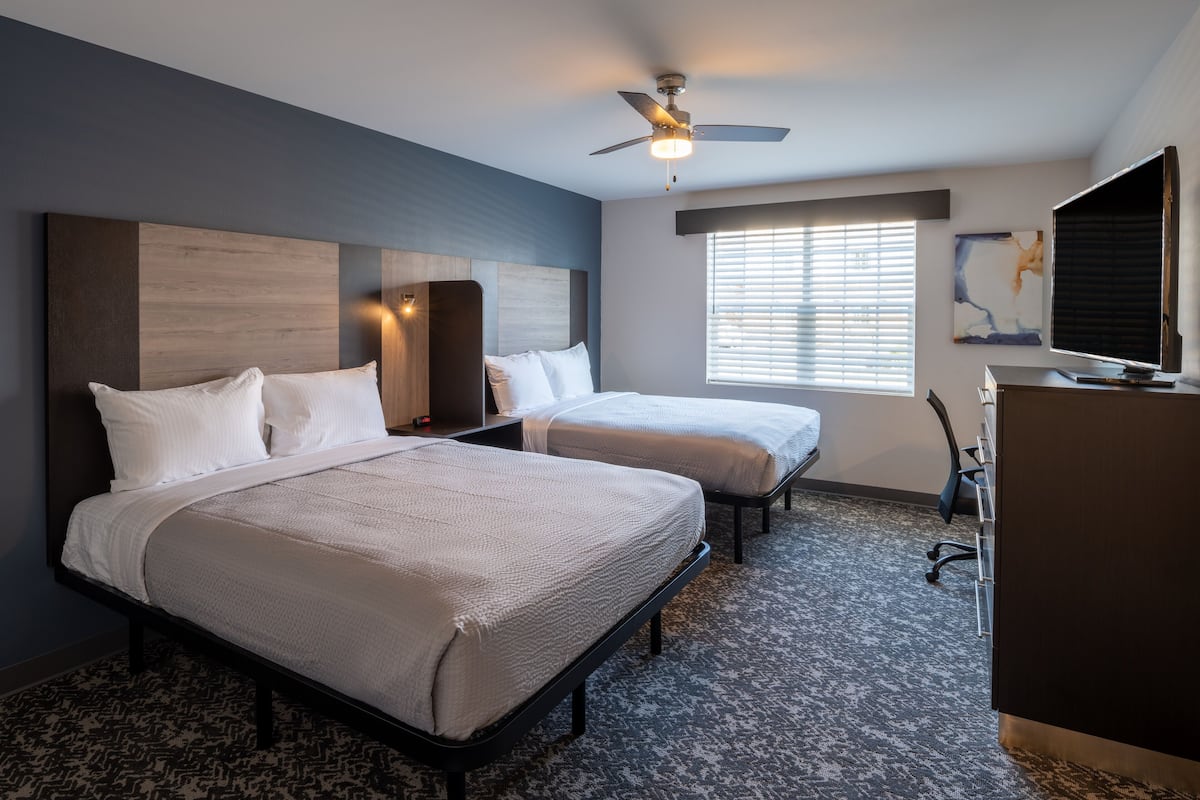 Suite, 2 Queen Beds | Desk, laptop workspace, free WiFi, bed sheets