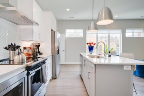Apartment, 2 Bedrooms | Private kitchen | Full-size fridge, microwave, stovetop, dishwasher