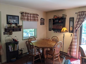 Enjoy family meals and gatherings in this inviting dining area with a dining table and four chairs.