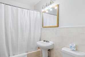 Combined shower/tub, soap, toilet paper