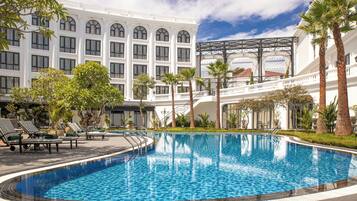 Outdoor pool, open 6:00 AM to 10:00 PM, pool umbrellas, sun loungers