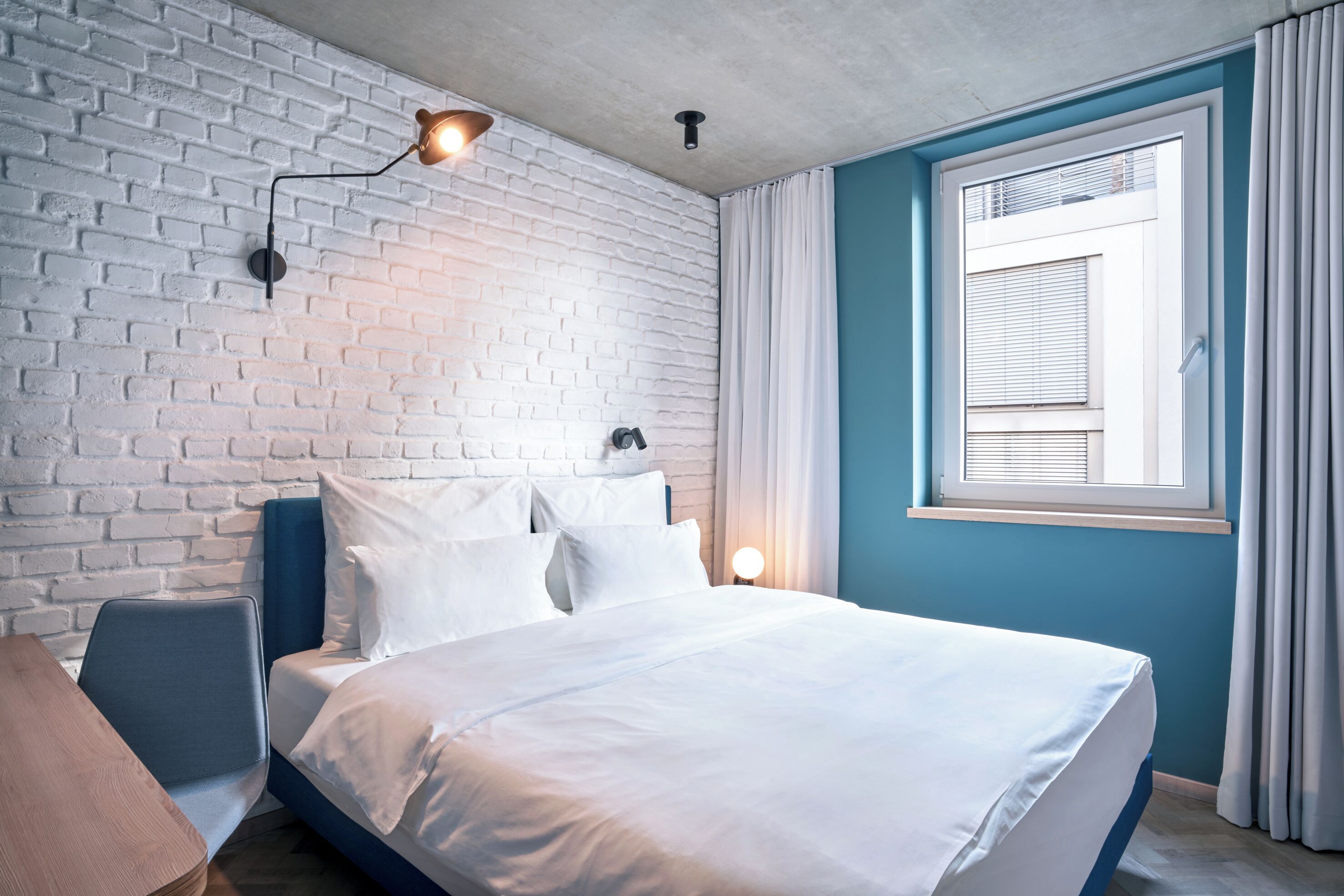 Urban Courtyard | Premium bedding, in-room safe, desk, blackout drapes