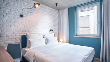 Urban Courtyard | Premium bedding, in-room safe, desk, blackout drapes