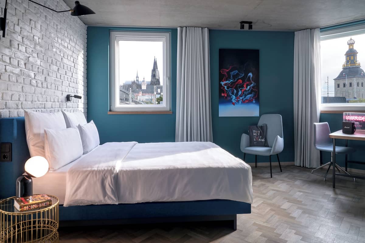 urban view | hypo-allergenic bedding, in-room safe, desk, blackout curtains