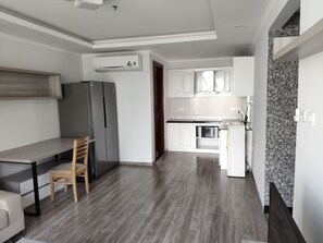Luxury Penthouse | Living area | 49-inch LCD TV with premium channels, TV