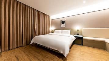 Rom – deluxe | Dundyner og wi-fi (inkludert)