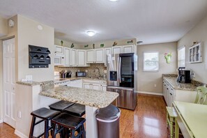 Fridge, microwave, oven, stovetop - Sea Site Retreat Unit A! Great amenities nearby! Short walk to the beach! (Bradenton Beach)