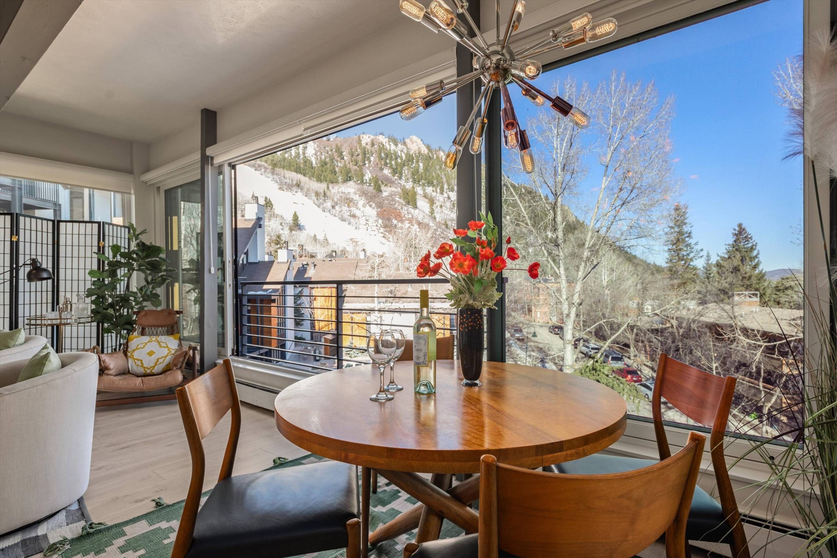 Watch the skiers on Aztec ski run from your dining table!