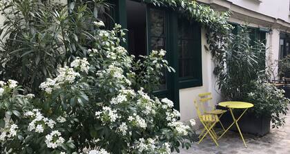 Charme Parisien, appartement au coeur d'une cour arborée et sécurisée