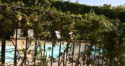 Luxury air-conditioned 3-bedroom gîte with private terrace and shared swimming pool