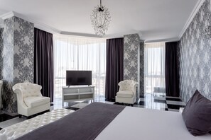 Luxury Room | Minibar, desk, laptop workspace, blackout drapes